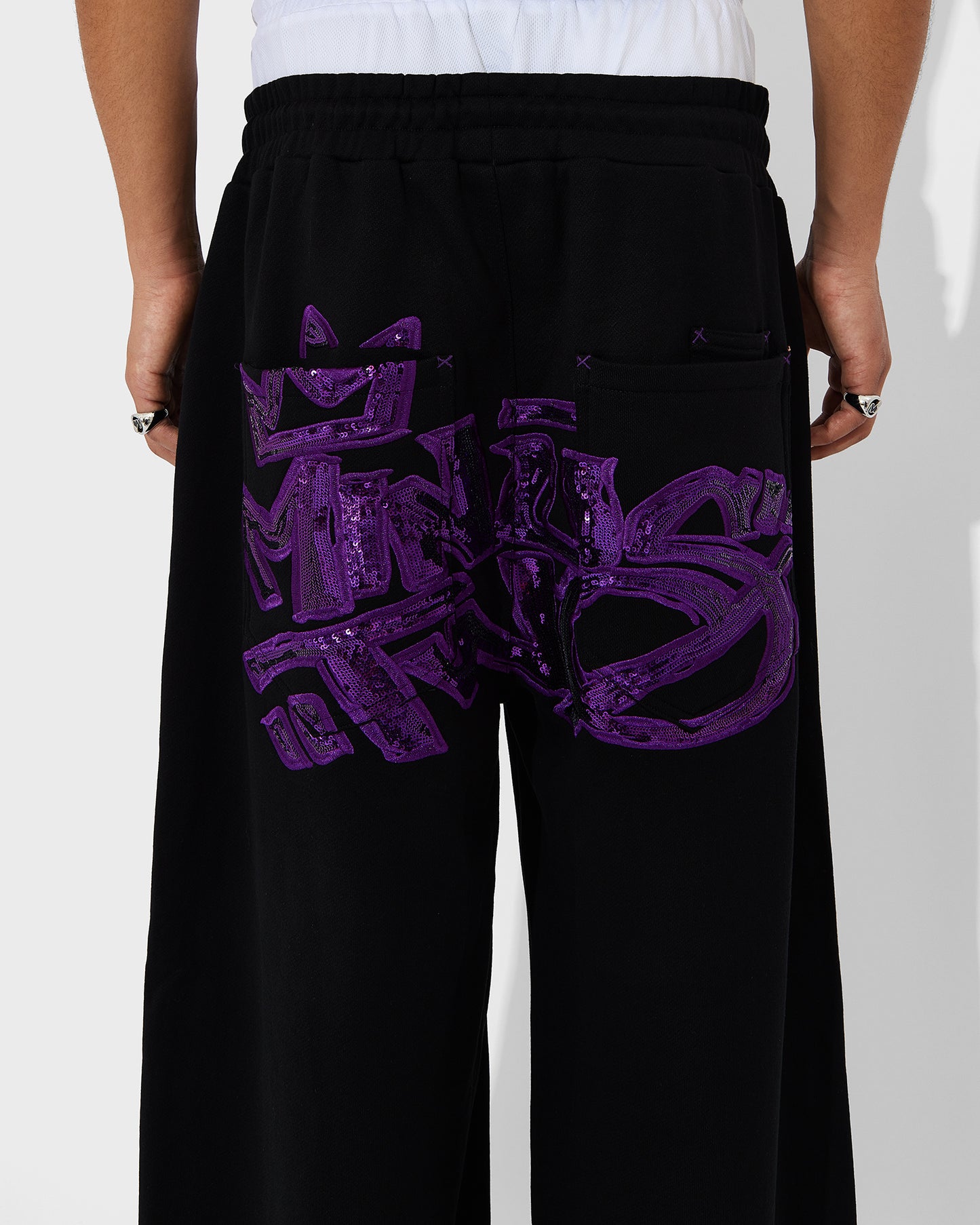 Pantalon de jogging avec logo couronne (logo violet)